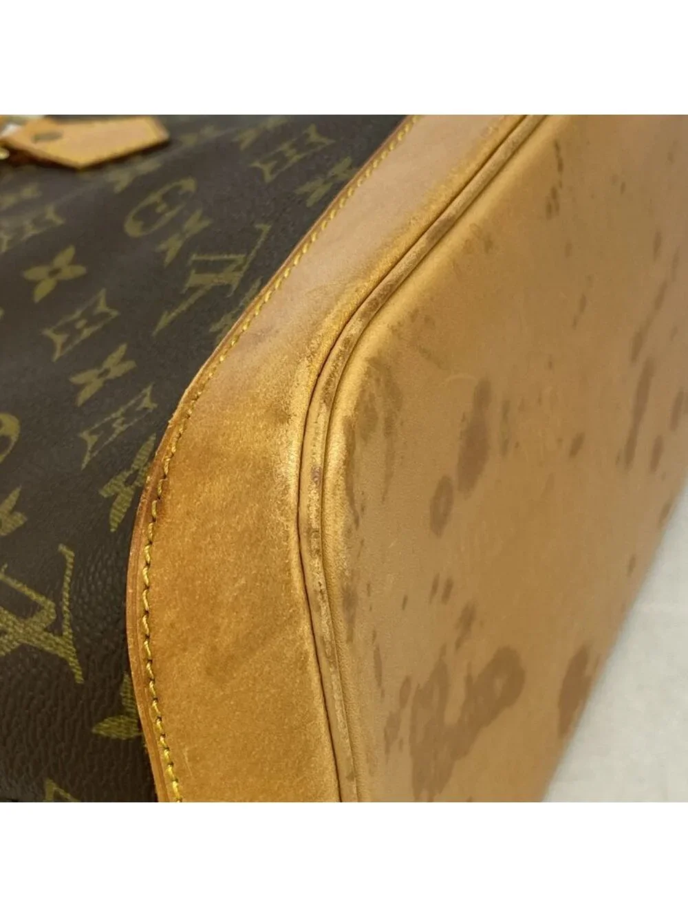 Louis Vuitton Monogram Alma Brown Handbag